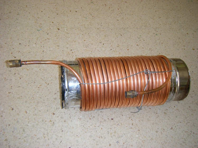 Vous pouvez construire un échangeur de chaleur à serpentin à partir d'un tuyau en cuivre conventionnel plié en spirale Échangeur de chaleur de tuyau de cheminée